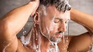 man in shower