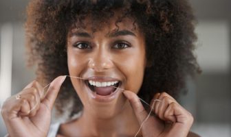 woman flossing