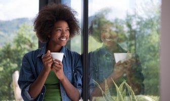Easy Ways to Improve your Home’s Air Quality this Winter happy woman